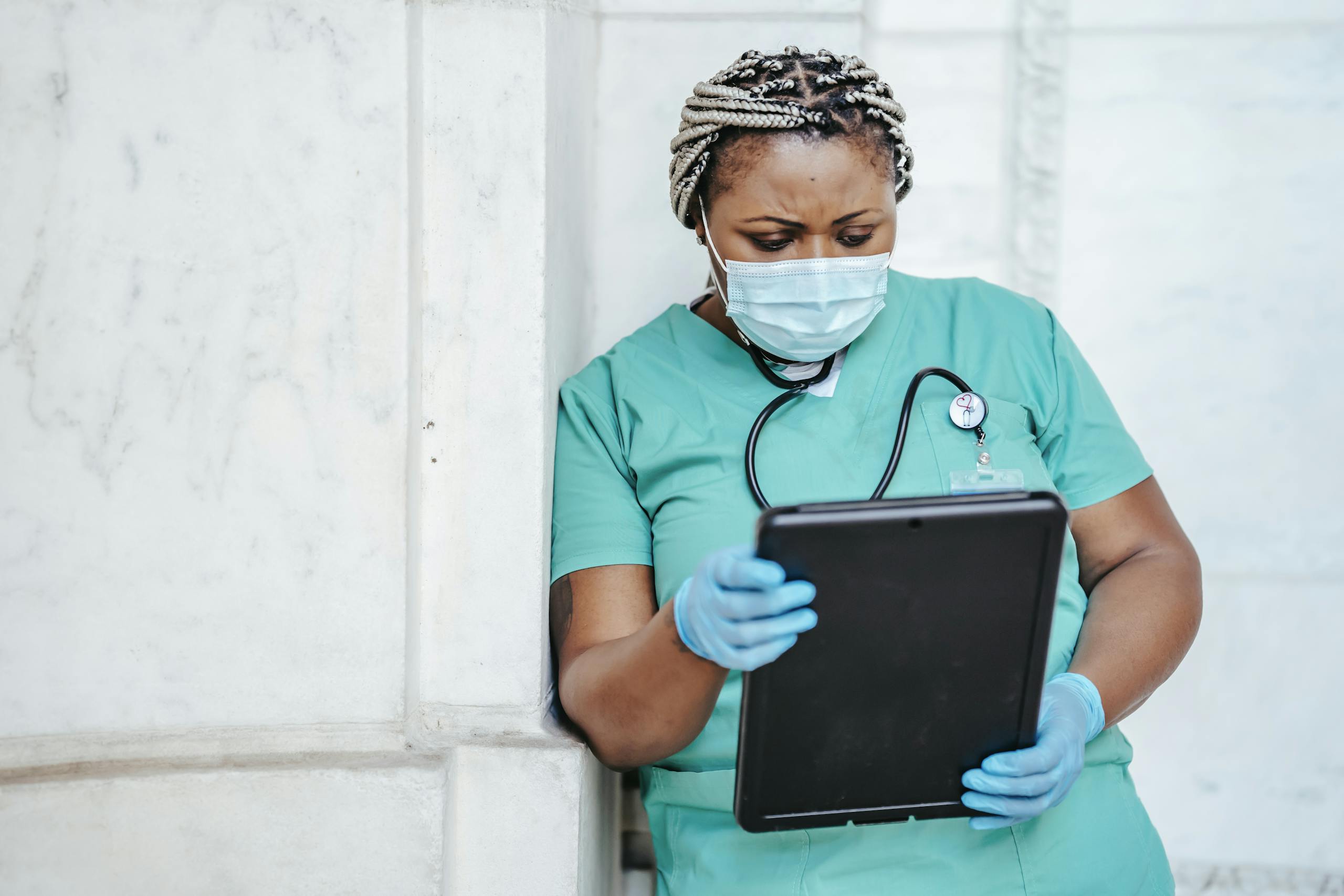 Focused woman with documents in hospital